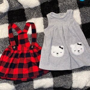 Two baby girl skirt jumpers